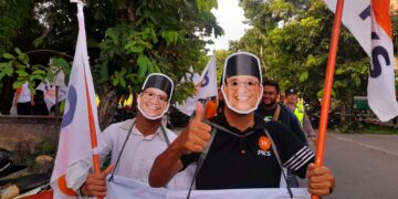 Wajah Anies-Muhaimin muncul di Renon, Denpasar dalam acara flash mop PKS Denpasar. Foto: Balitopik.com