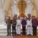 Wayan Koster (tengah) diapit oleh 2 Imam Katolik di Gereja Katedral Denpasar. -Balitopik.com