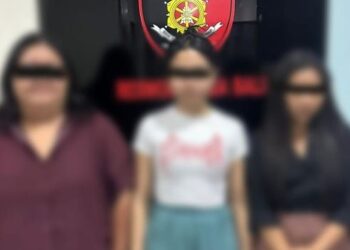 Tiga wanita yang ditangkap Ditreskrimum Polda Bali saat menggerebek Flame Spa di Kuta Utara, Badung. (Dok. Polda Bali)