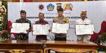 Penandatanganan Perpanjangan Nota Kesepakatan antara Pemerintah Provinsi Bali, Polda Bali, Korem 163/Wirastya dan Majelis Desa Adat Provinsi Bali. -Balitopik.com