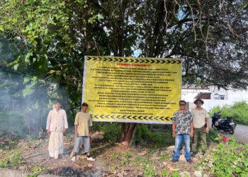 Tanah milik Wayan Pasar dan Wayan Ekayasa saat dipasani informasi kepemilikan lahan. -BALITOPIK.COM