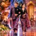 Foto: ilustrasi sepasang orang muda Bali sedang memakai kain endek Bali dalam acara fashion show. -BALITOPIK.COM