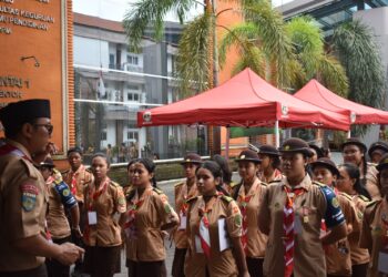 Sekretaris Bidang Satuan Karya Pramuka dan Satuan Komunitas (Sakoma) Kwarda Bali, Rudianto dalam sebuah acara pramuka. -BALITOPIK.COM