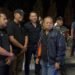Kasatpol PP Provinsi Bali I Dewa Nyoman Rai Dharmadi (tengah belakang) saat mengawal Gubernur Bali Wayan Koster. -BALITOPIK.COM